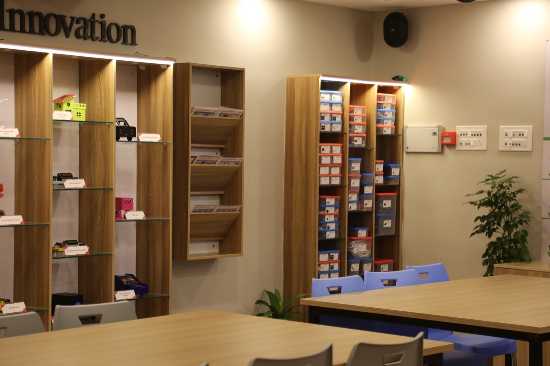 Composite Skill Lab with wooden shelves of kits and learning materials